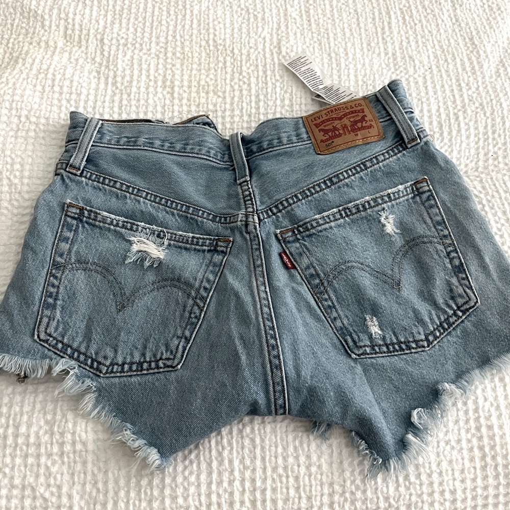 2 pairs of Levi’s, Risqué jeans, athletic shorts and body suit that had tags